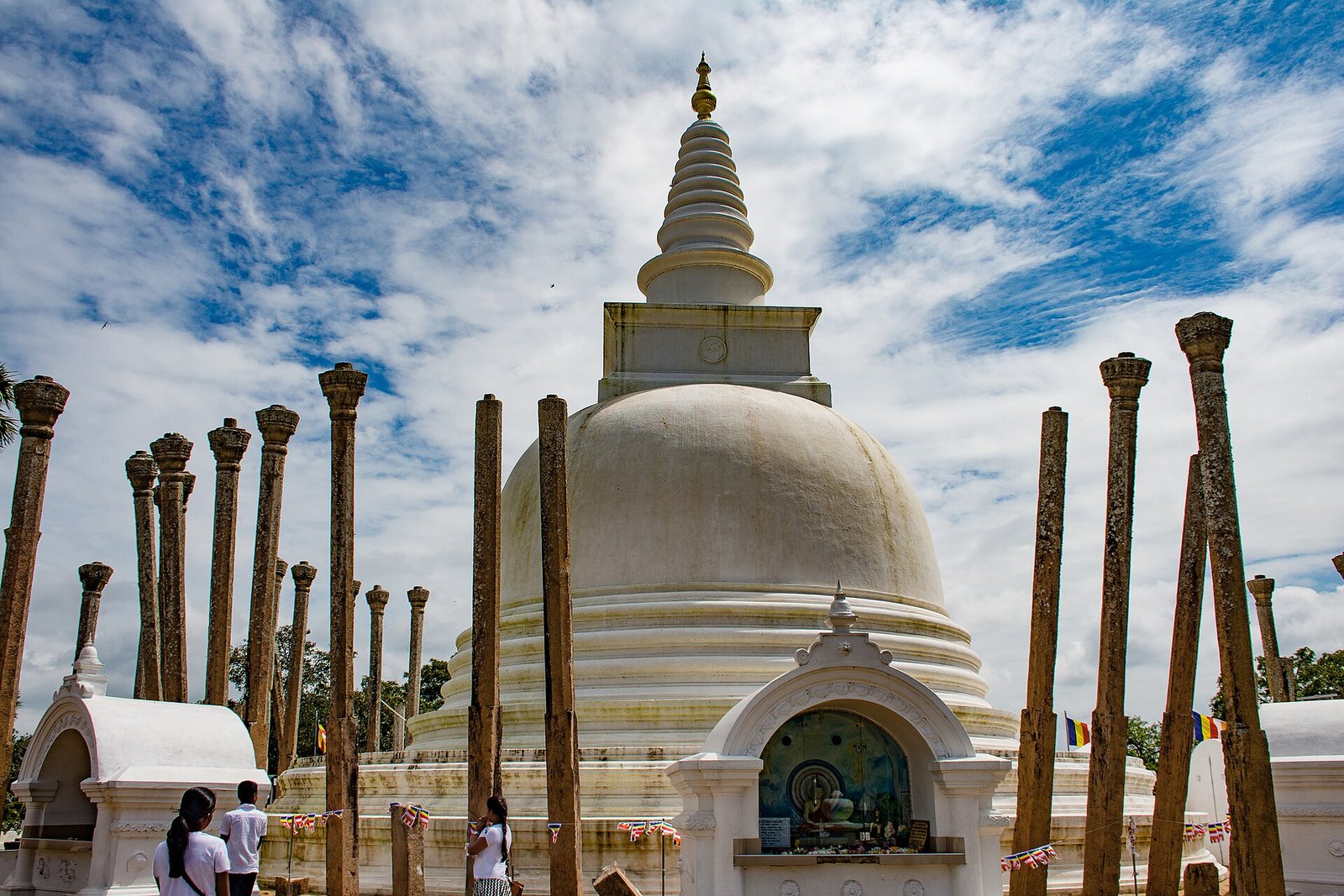 Thuparamaya stupa surrounded by ancient stone pillars in Anuradhapura