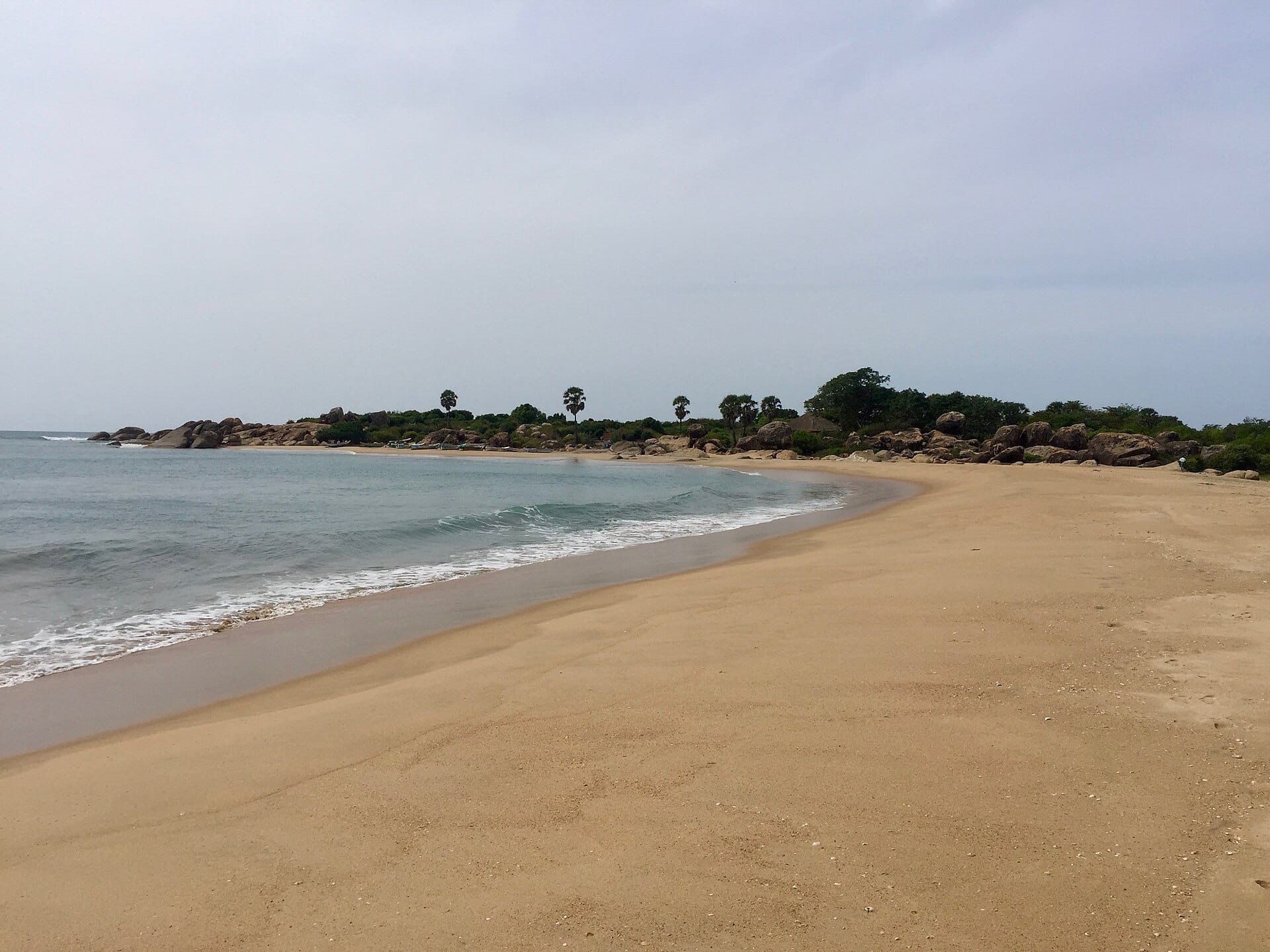 Quiet sandy beach at Whiskey Point near Arugam Bay