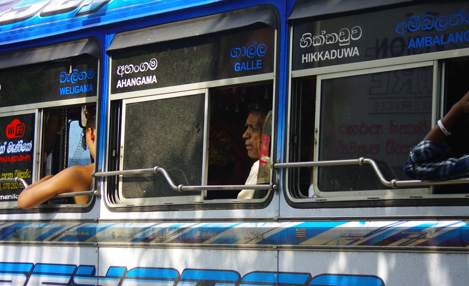 A local Sri Lankan bus with passengers on the Galle-Hikkaduwa route